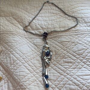 Whimsical Silvertone and Blue Pendant Necklace